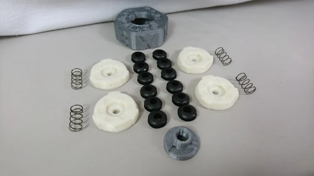 Losi DBXL-E 2.0 PVD-Fahrwerk 8S, zerlegter Bauteilesatz mit weißen Einsätzen, Federn und schwarzen Elementen