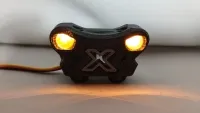 X-Maxx-Frontleuchte Position-Light 5000 mit zwei orange leuchtenden LEDs