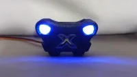 X-Maxx-Frontleuchte Position-Light 5000 mit zwei blau leuchtenden LEDs