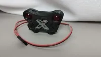 Position-Light-5000-Rückleuchte für Traxxas X-Maxx mit zwei dunkelroten Linsen und X-Symbol