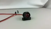 Jato-Light-Rücklicht für Traxxas Jato 4x4 mit runder dunkelroter Linse im schwarzen Gehäuse